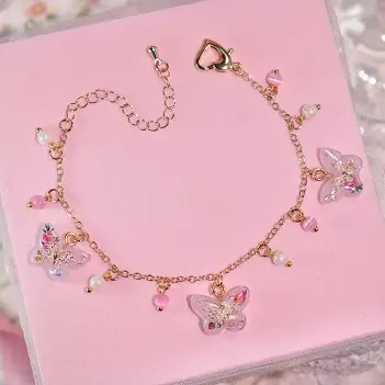 ข้อมือผีเสื้อชมพูลูกปัดขาวชมพู สร้อยข้อมือ MIMEAR