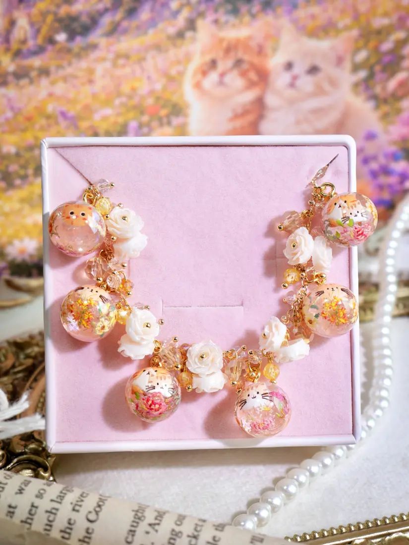 ข้อมือกลมแมวดอกไม้ส้ม สร้อยข้อมือ MIMEAR